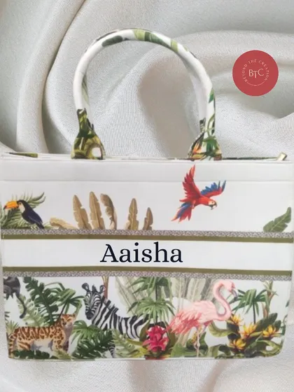 A mini jungle print tote bag, customised for 'Aaisha'. These smaller bags are great for kids or as a chic little handbag.