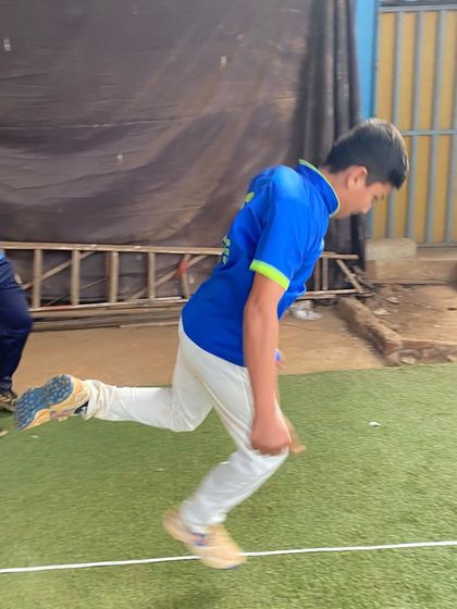 A player practices agility jumps during a training session. This type of plyometric exercise is key for developing explosive power and speed.