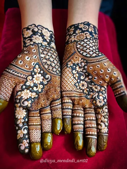 A beautiful example of reverse-fill technique, where the background is filled in dark, making the lighter floral patterns pop. This creates a bold and eye-catching effect.