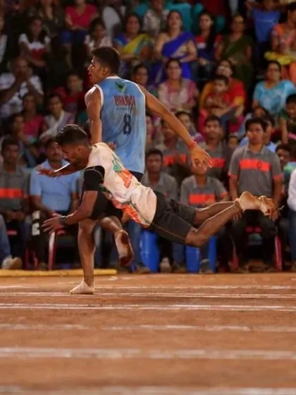 Dipesh More executing a spectacular mid-air tag.