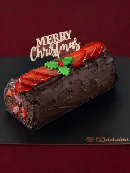 A classic Christmas Yule Log filled with rich chocolate and fresh strawberries. This traditional holiday dessert is a must-have for any Christmas gathering.