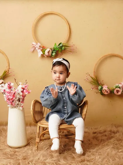 This little lady looks like she's about to give a speech! Milestone sessions are perfect for capturing these funny and expressive moments.