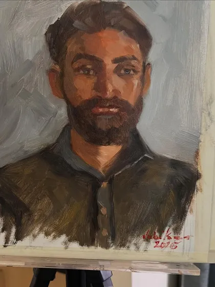 A detailed shot of the finished portrait of Rishabh on the easel. The goal of these alla prima sessions is to capture the fresh, immediate impression of the subject.