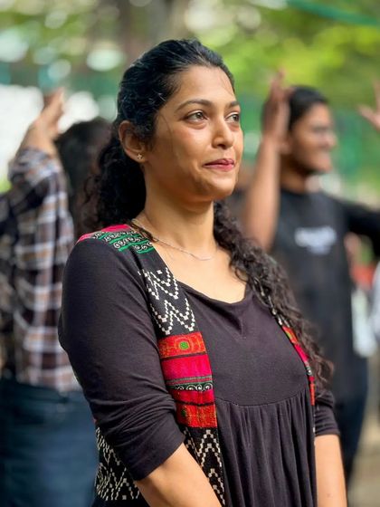 A moment of graceful focus during our dance workshop. Our community gatherings are a mix of high-energy fun and moments of artistic expression.