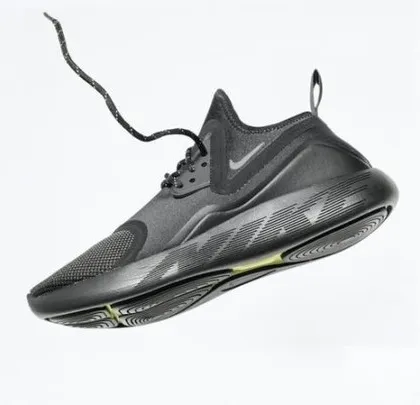 We use techniques like floating-item photography to create dynamic and clean product images. This shot of a black athletic shoe against a white background is modern, sleek, and perfect for e-commerce banners.