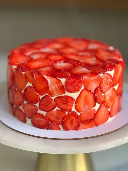 Endless supply of strawberries will fix us! This is my Strawberry, Vanilla Bean, and Mascarpone cake. Think of it as a strawberry cream cake, but taken up about 100 levels.