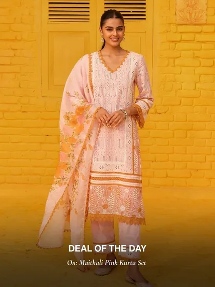 My Maithali Pink Kurta Set is a beautiful peachy-pink hue with contrasting orange details. It’s a warm and inviting color combination perfect for any season.