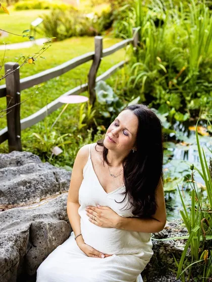 Sometimes, the best shots are the quiet ones. This expecting mother is taking a peaceful moment to soak in the sun and connect with her baby. My goal is to capture the feeling of pregnancy, and this serene portrait does just that.