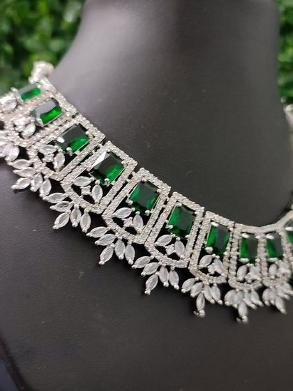 A close-up of a similar emerald-green AD necklace with a slightly different pattern, showcasing the variety in my collection.