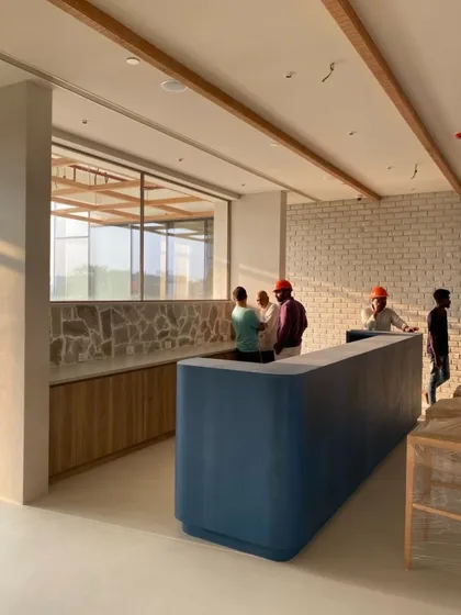Another behind-the-scenes shot of the Godrej Woods Clubhouse, capturing the team during the construction phase. This highlights the collaborative effort required to bring a large-scale hospitality project to life.