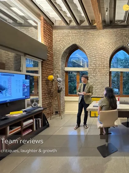 A snapshot of team reviews at The Loft. A space for critiques, laughter, and growth.