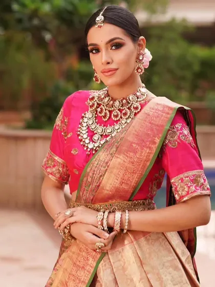 The final look is a beautiful fusion of tradition and modernity, showcasing the versatility of a classic Kanjeevaram saree.