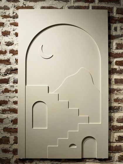 A close-up of one of the 'Ashta Prahar' wall murals. The design uses simple geometric shapes, arches, and stairs to evoke a sense of place and time.