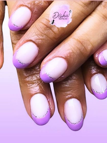 A little silver sparkle to seal the deal. This lavender French manicure is enhanced with a fine line of silver glitter for a touch of glam.