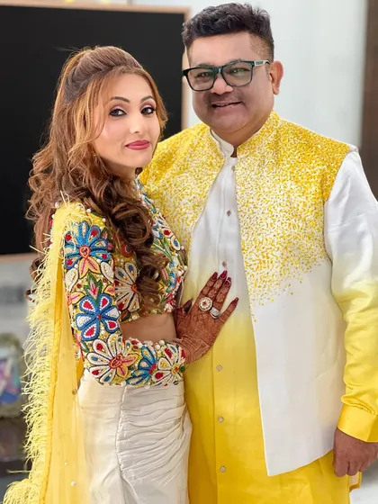 A lovely couple shot, both dressed to perfection for the carnival party.