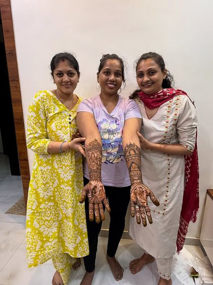Three of my brilliant students showing their full bridal mehndi work. The intricacy and storytelling in their designs are a testament to their hard work and the skills they learned.