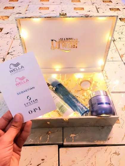 The final look of our fairy-light-lit Diwali hamper for Wella. This project shows how we combine product sampling with a memorable, festive experience.