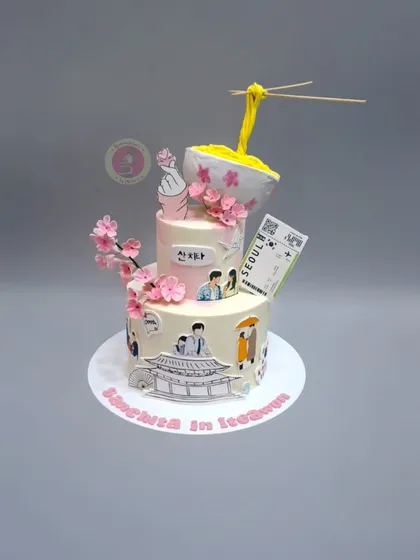 A K-drama themed cake that brings together iconic scenes and symbols, including a floating bowl of ramen. This is a perfect example of how we can turn any passion into a cake masterpiece.