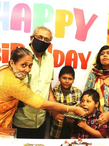 A sweet moment between generations. Grandparents sharing in the joy of a birthday celebration is what it's all about. We provide a comfortable and happy environment for the entire family.