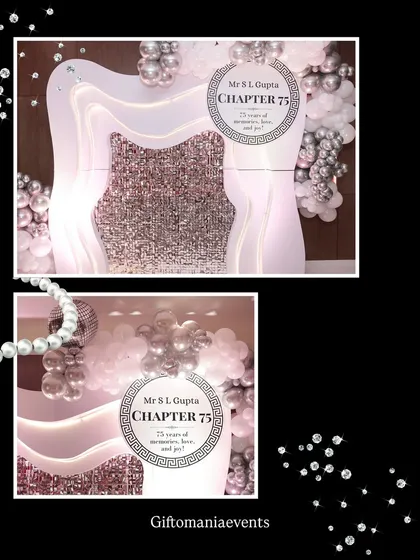 Another perspective of the custom-designed backdrop, showing how the silver balloon clusters integrate with the layered panels. This highlights the careful planning of every visual component for a cohesive look.