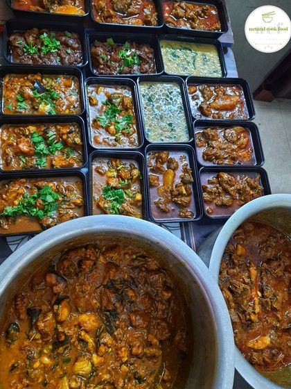 A large catering order with 'Sareng thongba', duck curry, 'ooti' (dal), and liver and gizzard fry.