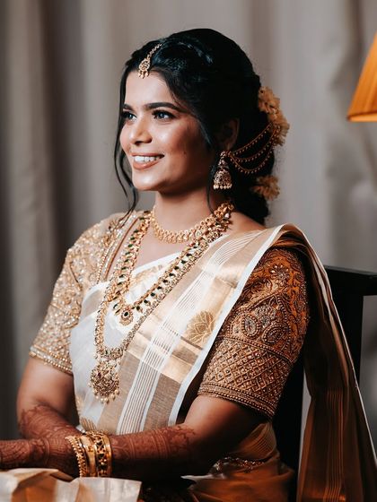 A smiling portrait of the bride. Her genuine happiness shines through, making this one of the most precious memories of her wedding day.