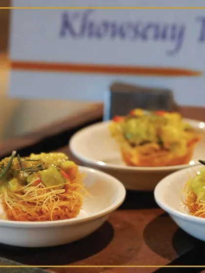 A unique twist on a classic, our Khowsuey Tart combines the rich coconut and spice flavors of the Burmese soup in a crispy, buttery tart shell.