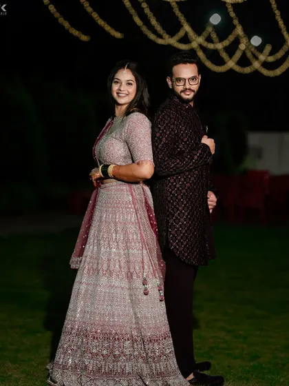 A full-length shot of the couple, looking absolutely stunning for their reception. My goal is to make sure couples feel confident and look amazing in their photos.