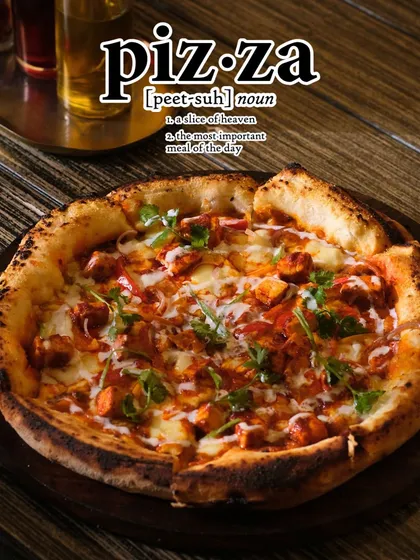 Here’s the dictionary definition of pizza, my way: a slice of heaven and the most important meal of the day. I stand by it.