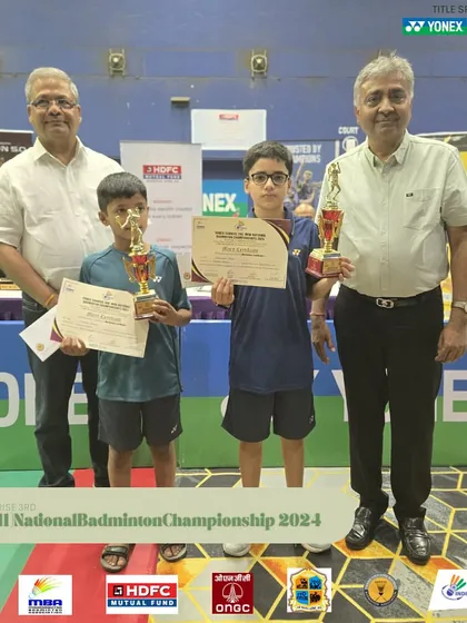 More young winners being felicitated at the Mini National Badminton Championship.