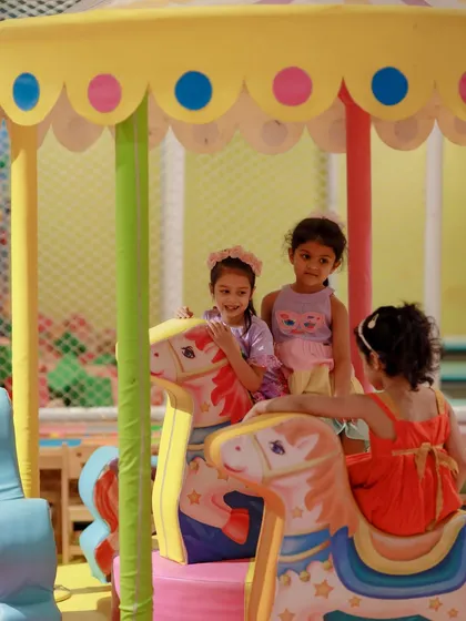 The carousel is a popular spot for friends to gather during one of our magical unicorn birthday parties.