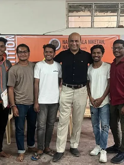 A moment with another group of aspiring artists. Building a supportive community is as important as teaching technical skills.