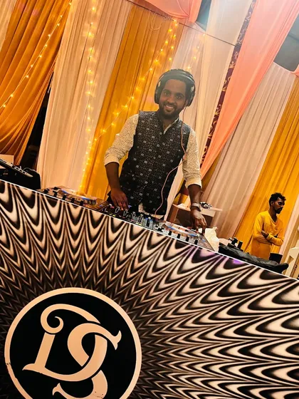 Here I am, ready for another amazing wedding night. I bring a professional setup and a positive attitude to every event, ensuring the music and the vibe are on point from start to finish.