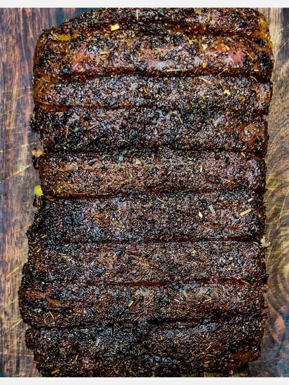 Another view of the Herb Crusted Karnivore Ribs, showcasing the texture of the spice rub.
