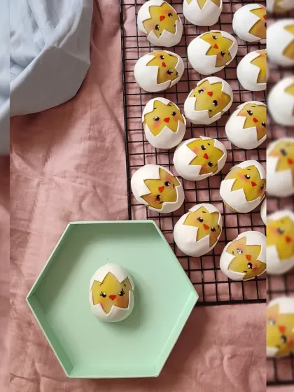 My marzipan Easter eggs are a seasonal favourite. This image shows a tray of adorable chicks hatching from their shells, each one hand-painted and ready to bring a smile to someone's face.