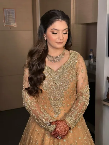 A close-up of the soft glam makeup paired with beautiful, voluminous waves. This is for the bride who wants to look like herself, but elevated.