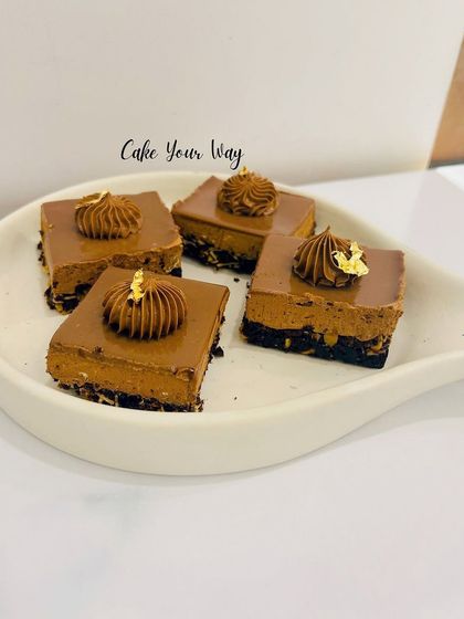 My Bournvita Milk Bars are a hit with both kids and adults. These bite-sized pastries feature a rich chocolate and malt flavor, finished with a swirl of frosting and a touch of edible gold.