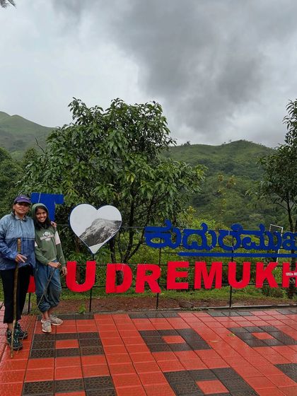A mother and daughter duo at the Kudremukha entrance, ready to take on the trek together. We welcome adventurers of all ages.