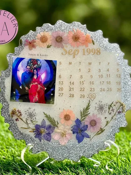 Celebrating a silver jubilee is a huge milestone. I created this special anniversary frame with a silver glitter finish and preserved flowers to honor 25 years of love.