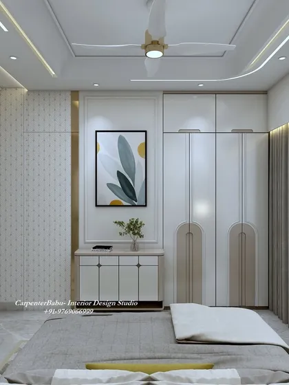 This bedroom features a simple, patterned wallpaper and a wardrobe with unique arched inlays. The design is subtle, elegant, and has a touch of classic charm.