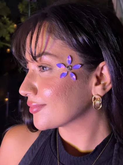 This floral design is made entirely of petal-shaped jewels. It's a unique and eye-catching piece that looks so beautiful and feminine.