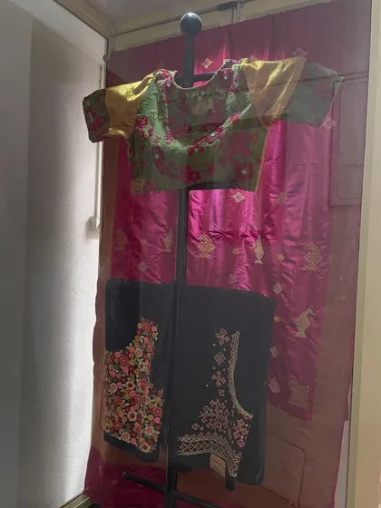 A display of hand-embroidered blouses at my studio. I have an open house every day for you to come and explore my collection of ready-to-wear embroidered products.