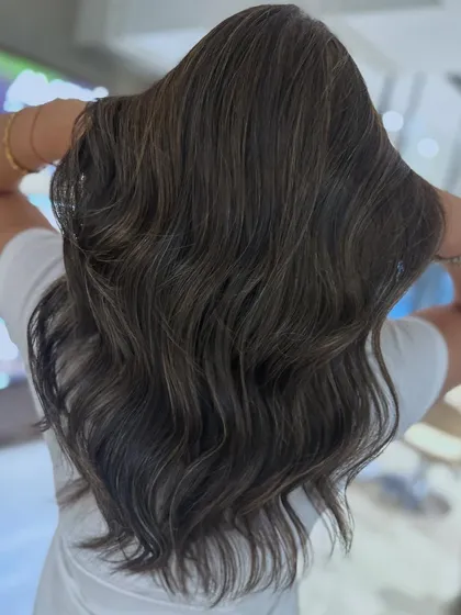 Cool-tone babylights are perfect for a subtle, blended look. This technique adds a touch of brightness and dimension without a drastic change.