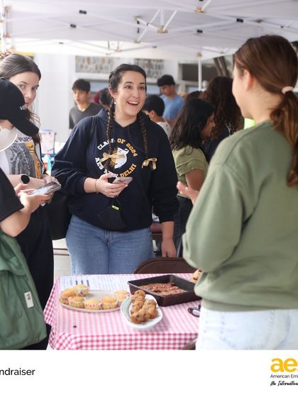 Grade 8 students run a bake sale to raise funds and awareness for a social issue they researched. This project challenges them to take civic action and promote positive change.