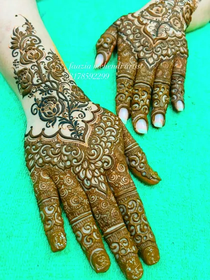 I am in love with this design. It combines delicate floral patterns with modern cutwork, leaving some negative space that makes the whole design pop.