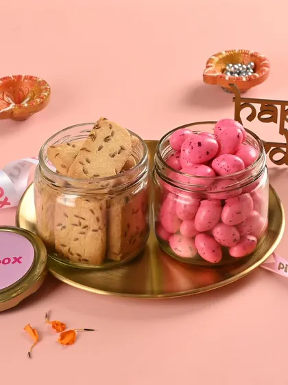 Simple and sweet, the "Mithaas" hamper pairs our savory Jeera Cookies with the sweet crunch of Pink Rose Flavored Almond Dragees.