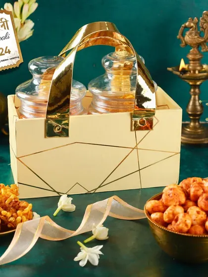 A beautifully styled shot of our two-jar caddy hamper, perfect for gifting savory snacks like roasted makhana during Diwali.