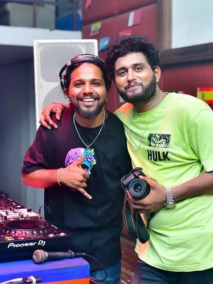 Spinning tunes and capturing memories with my friend and photographer. It's great to have a team that feels like family.