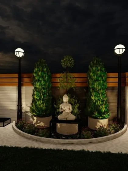 A tranquil corner of a terrace featuring a Buddha statue surrounded by lush plants and soft lighting. This design creates a peaceful and meditative space for quiet reflection.