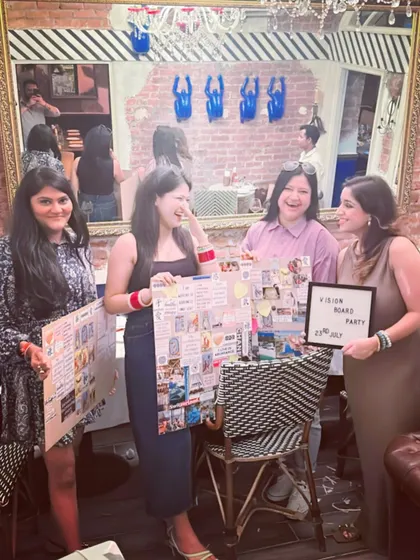 Look at these happy faces and their finished vision boards! This is the moment it all comes together. Each board is a unique visual prayer, a tangible reminder of the goals and dreams we set out to achieve.